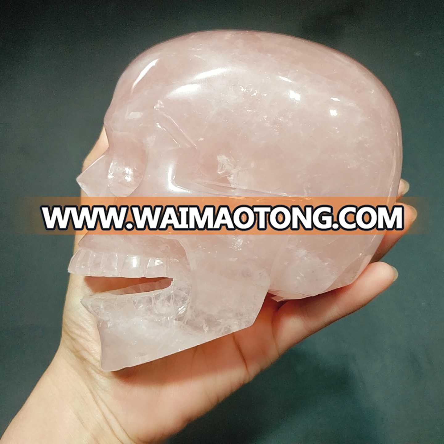 Wholesale natural crystal carvings crystal quartz skulls rose quartz skulls smile healing decoration