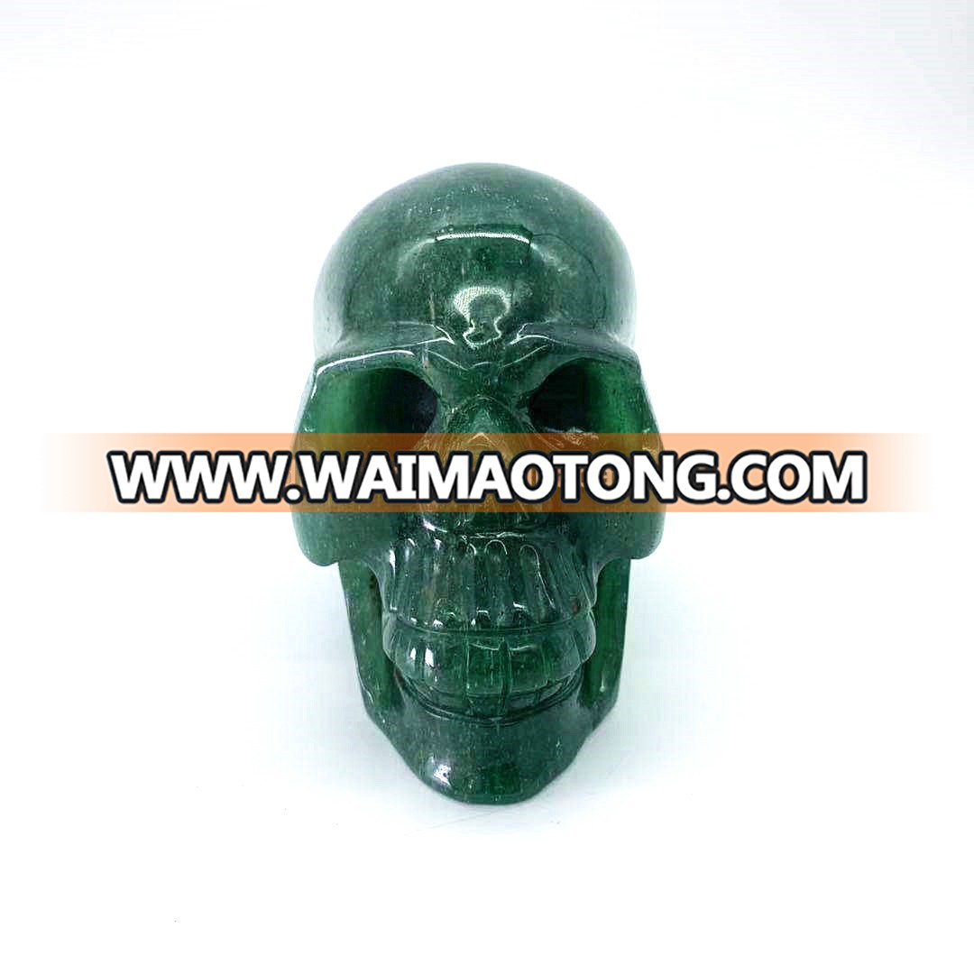 Wholesale natural hand carved crystal green strawberry stone skulls crystal craft skull for decoration