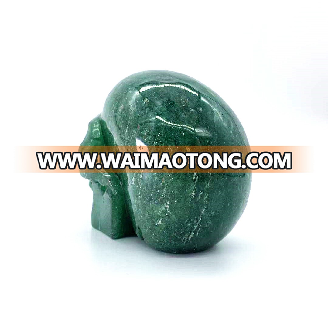 Wholesale natural hand carved crystal green strawberry stone skulls crystal craft skull for decoration