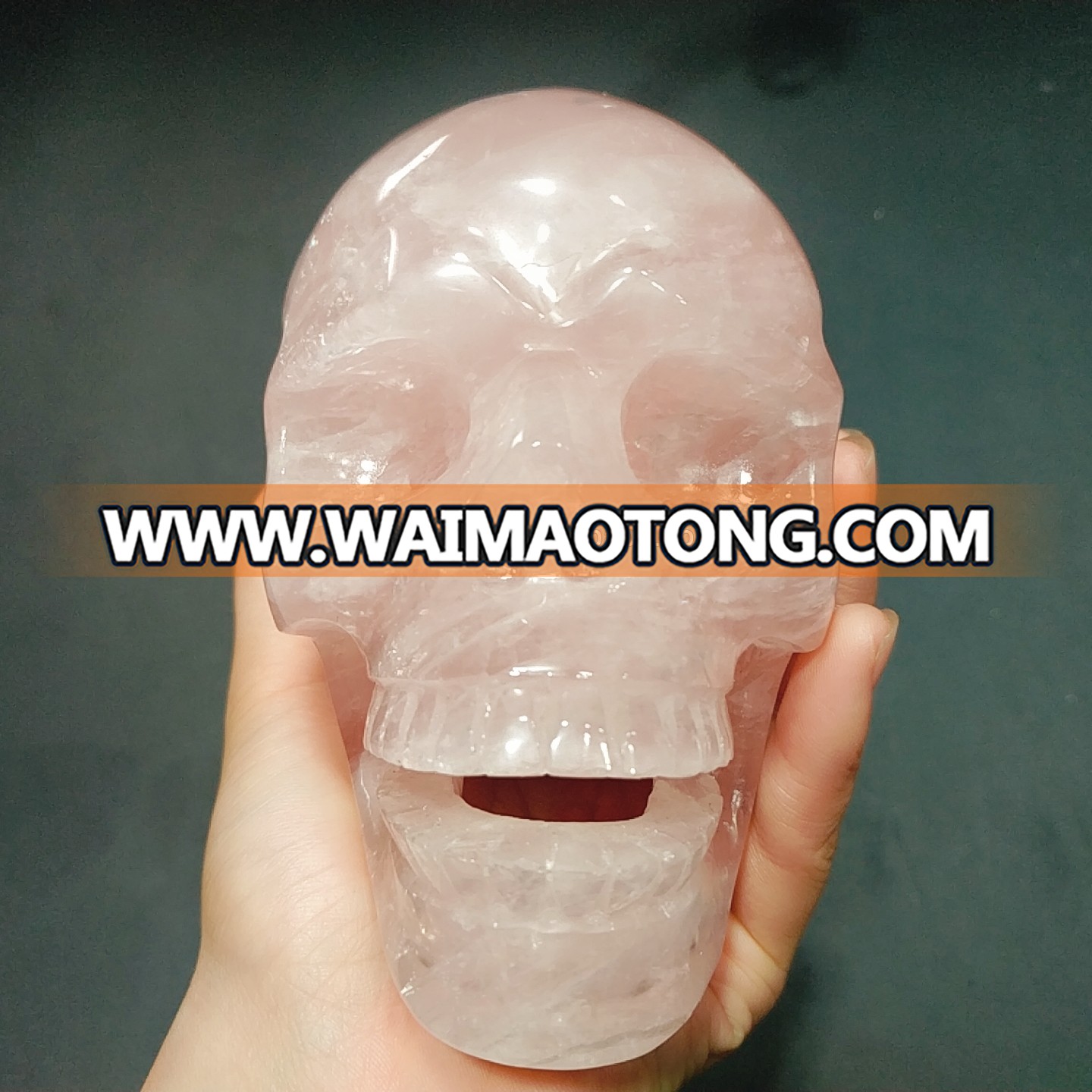 Wholesale natural crystal carvings crystal quartz skulls rose quartz skulls smile healing decoration