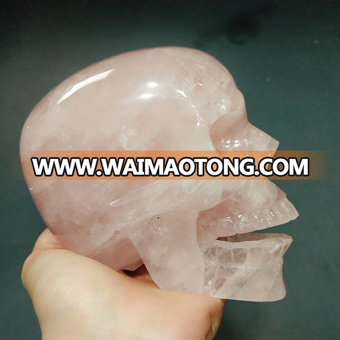 Wholesale natural crystal carvings crystal quartz skulls rose quartz skulls smile healing decoration