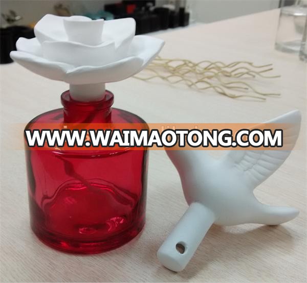 color sprayed empty aroma reed diffuser glass bottle with ceramic bird TS-DBA010