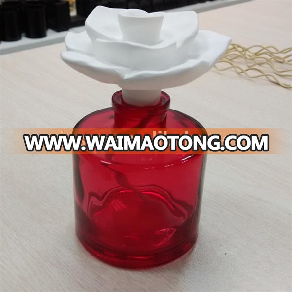 color sprayed empty aroma reed diffuser glass bottle with ceramic bird TS-DBA010