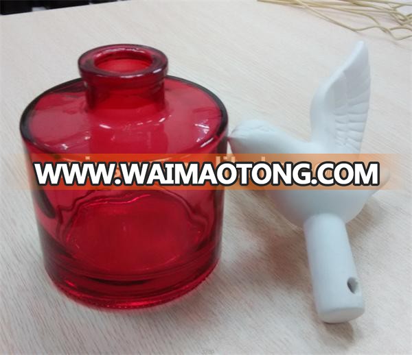 color sprayed empty aroma reed diffuser glass bottle with ceramic bird TS-DBA010