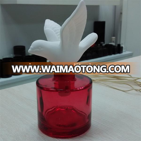 color sprayed empty aroma reed diffuser glass bottle with ceramic bird TS-DBA010