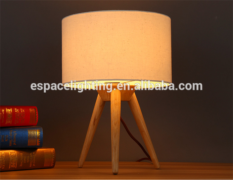 Modern wood tripod base table lamp with edison bulbs