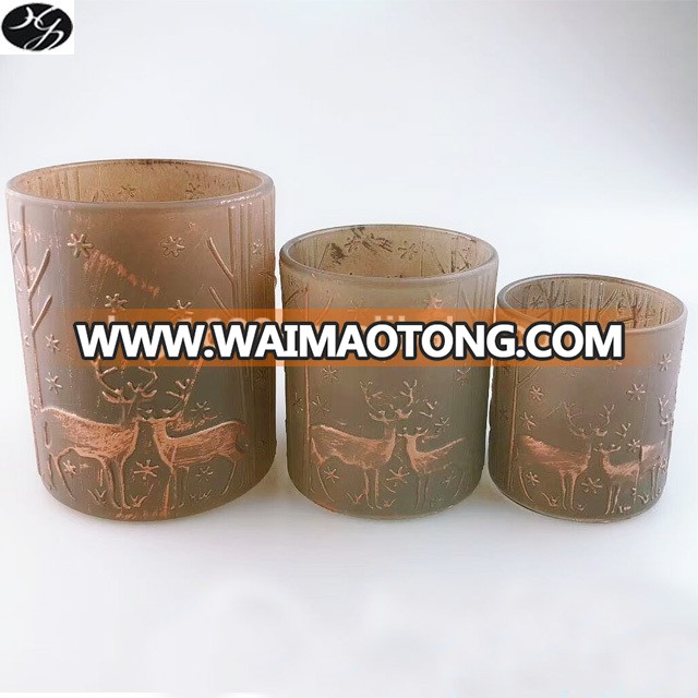 Unique hand painted decorative embossed amber glass candle jars