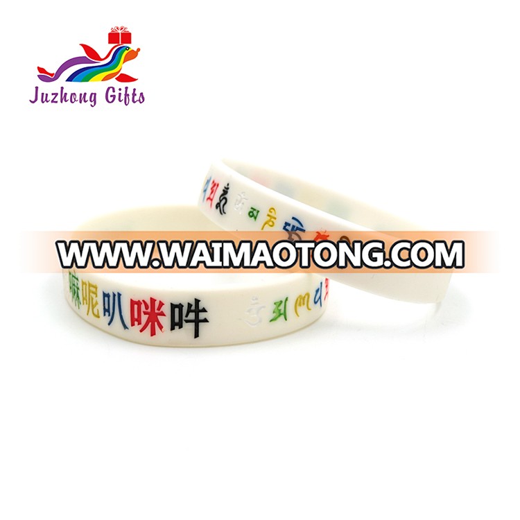 High quality low price color embossed print Buddhist custom logo silicone bracelet wristband