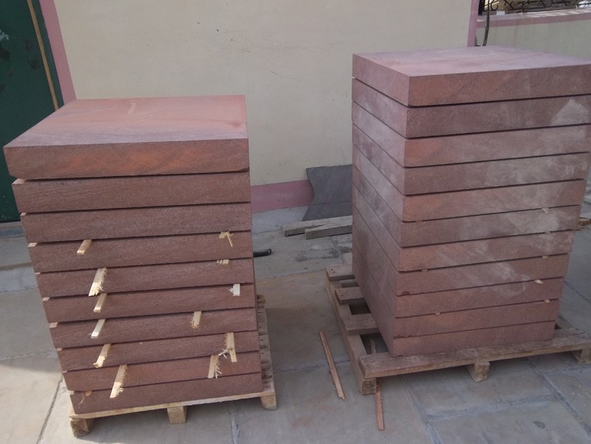 Low cost red sandstone bricks