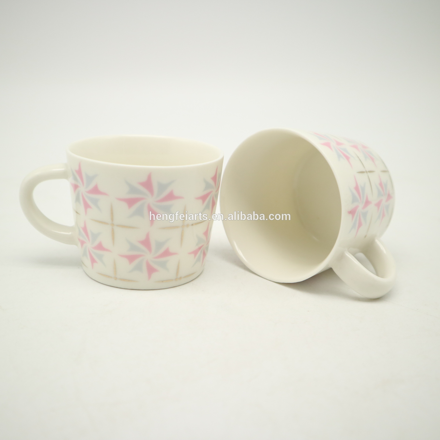 Small ceramic modern design pink color coffee cup with saucer