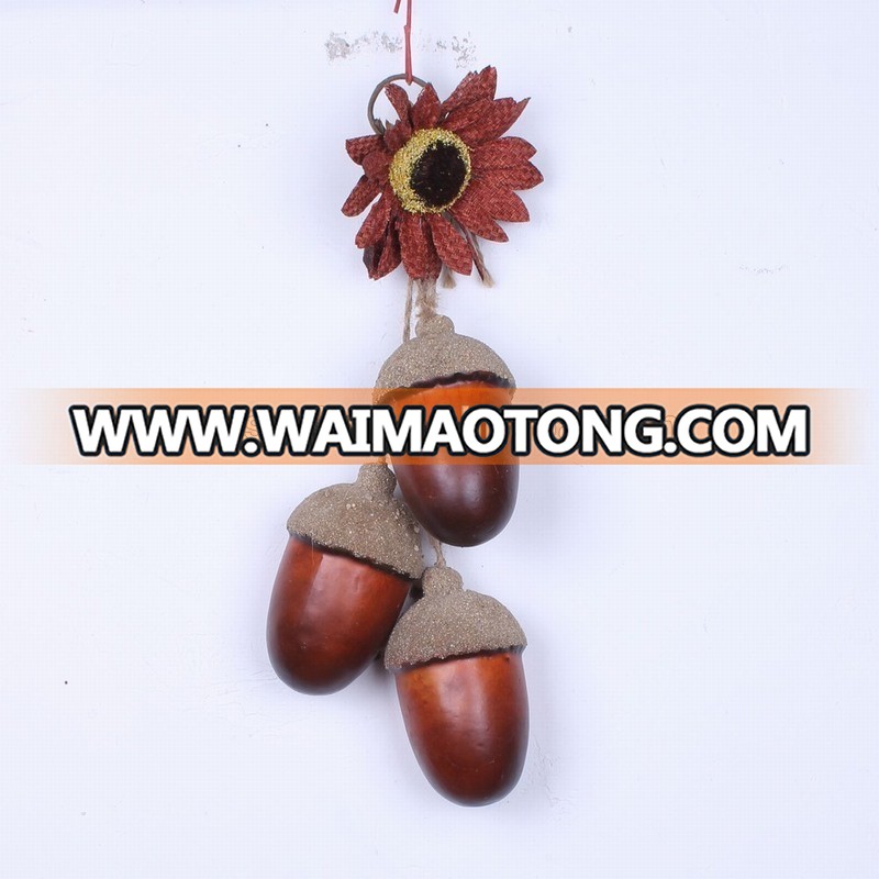 Durable decorated hanging faux acorn