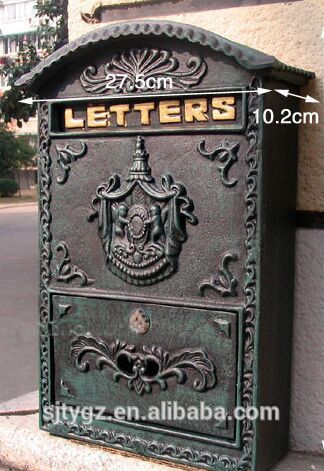 Antique wrought iron/cast iron wall mounted mailbox with embossed flower