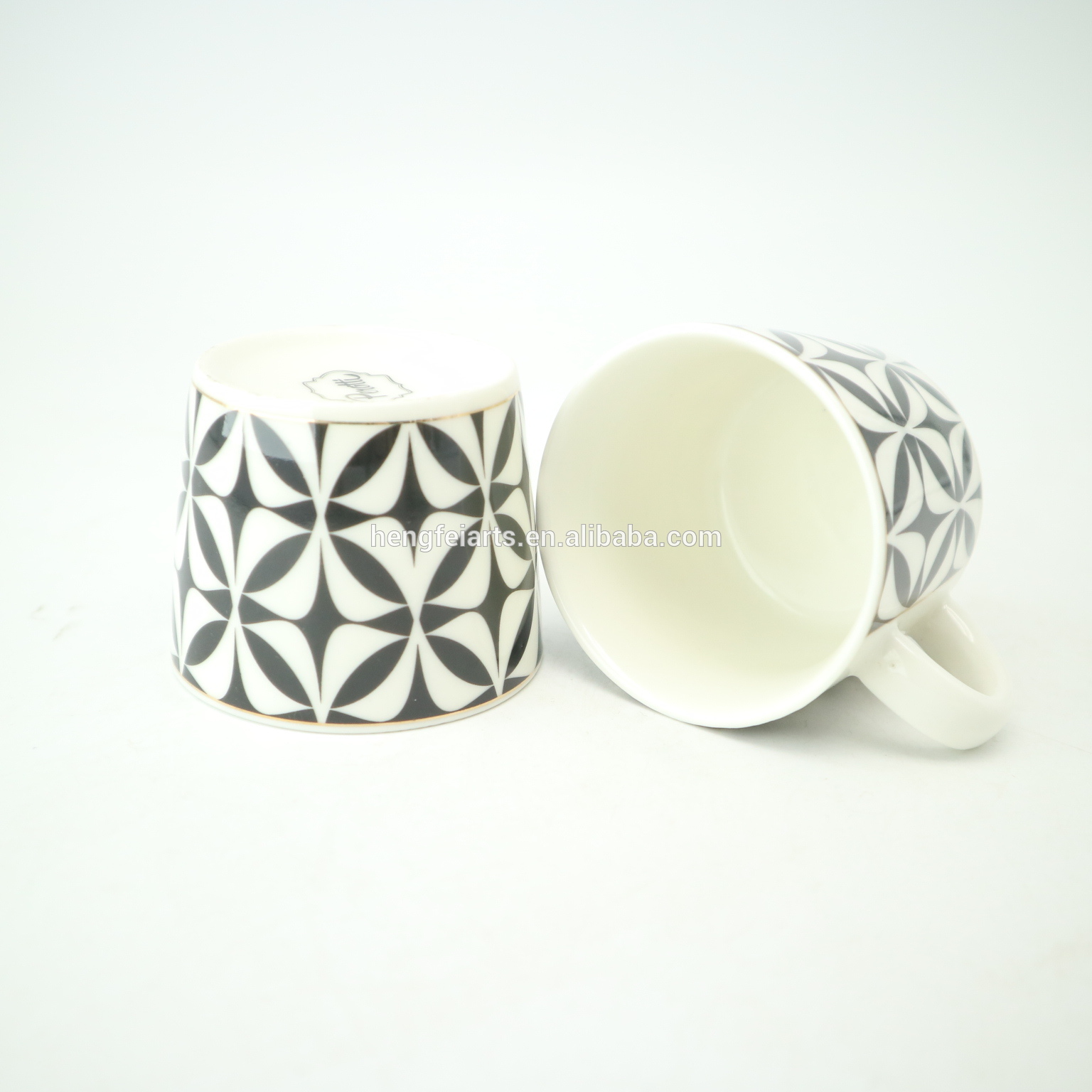 Small ceramic white & black modern design coffee cup with saucer