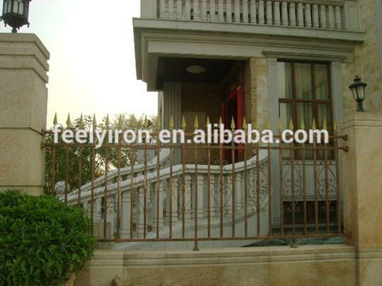 house outside iron fence FF-029