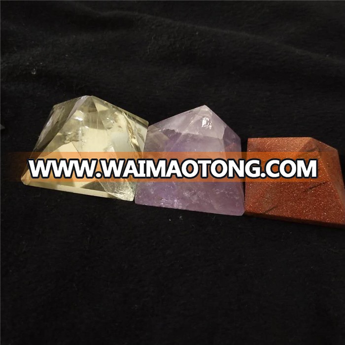 a variety of natural crystal pyramids