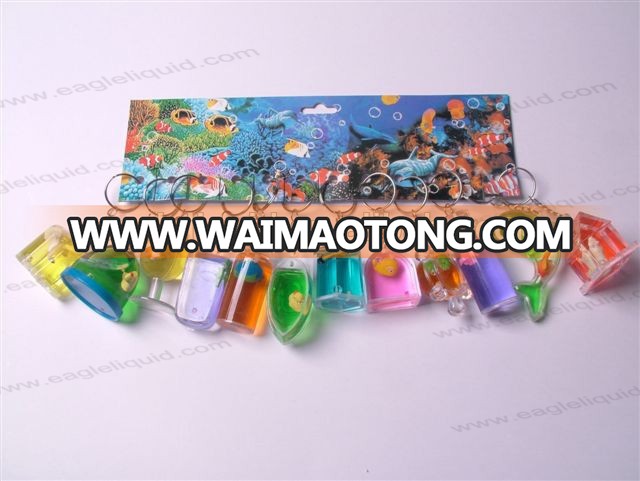 promotion custom plastic shell floating aqua keychain