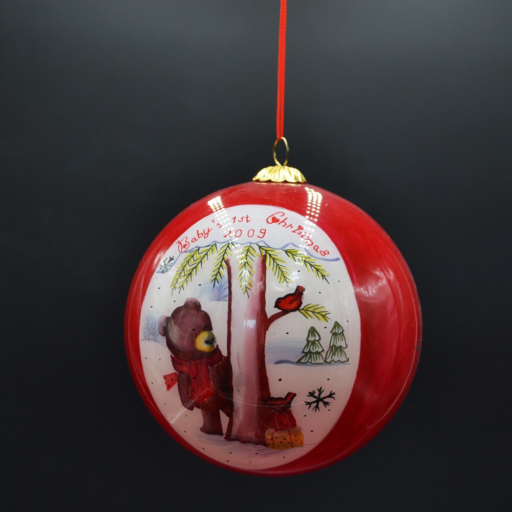 inside painting glass Christmas bauble for Christmas tree