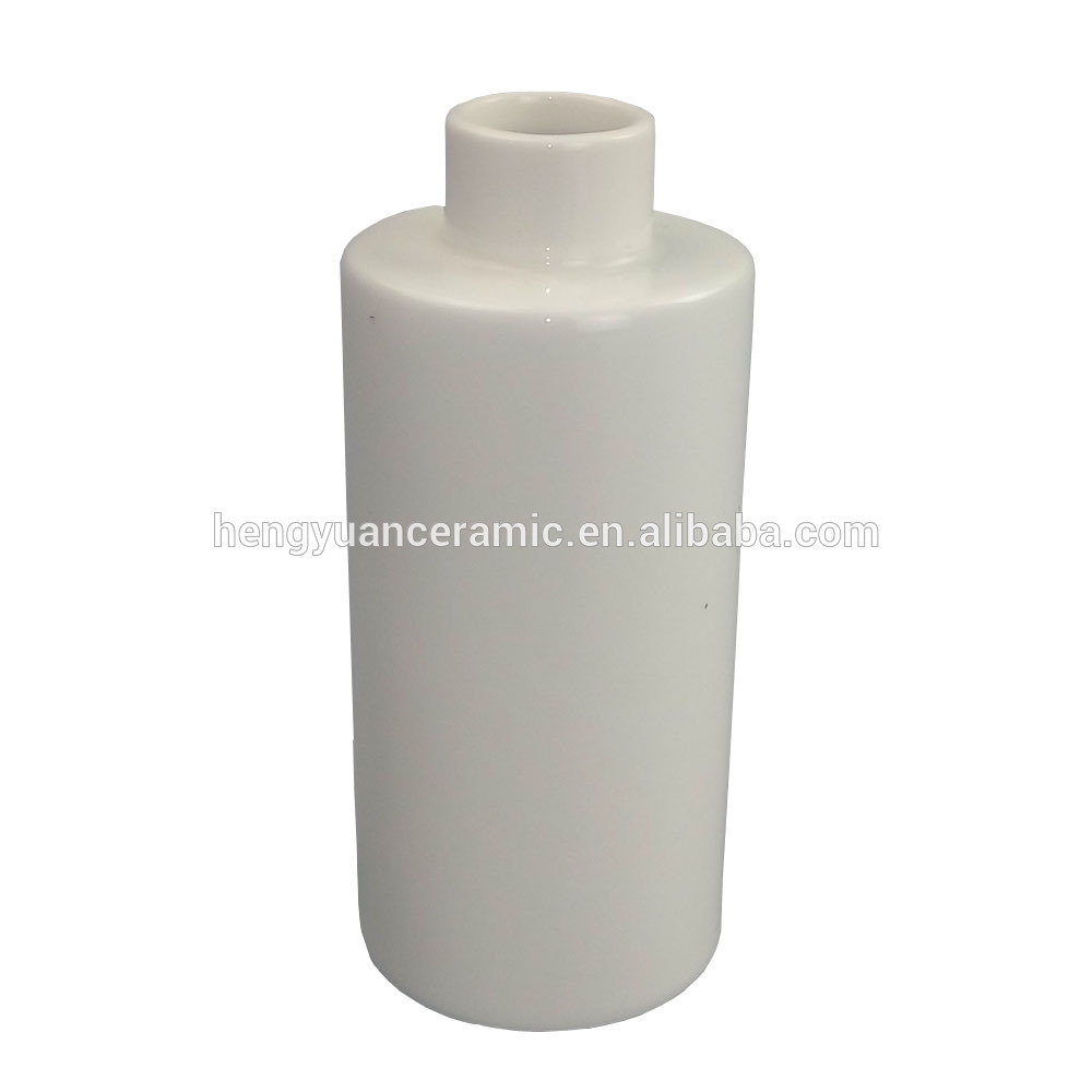 Simple white cylindrical porcelain bottle