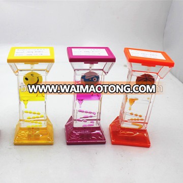 Factory price novelty crafts flowing colored liquid hour glass