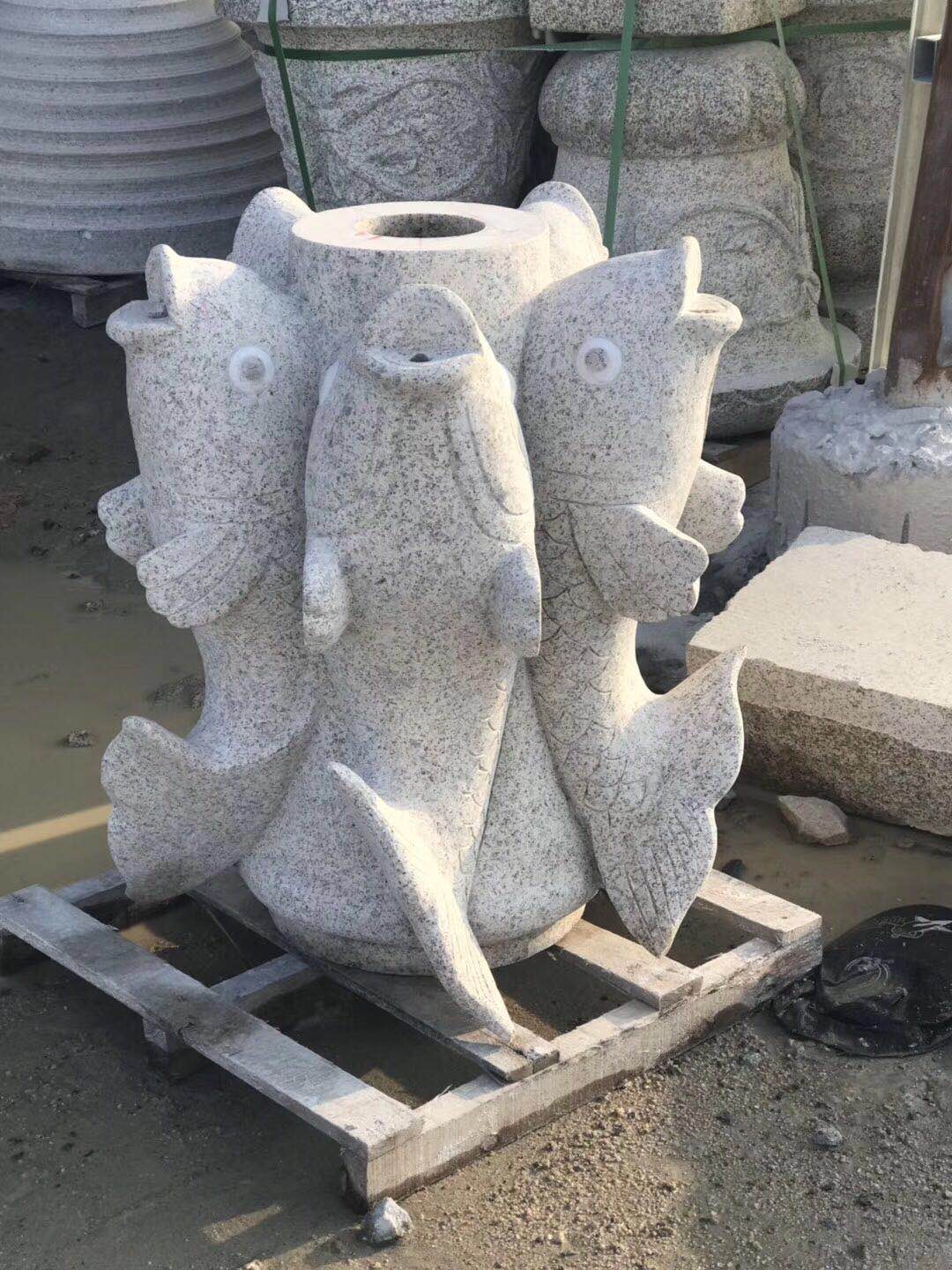 statue of  Carp fish  jumps carving made of Granite