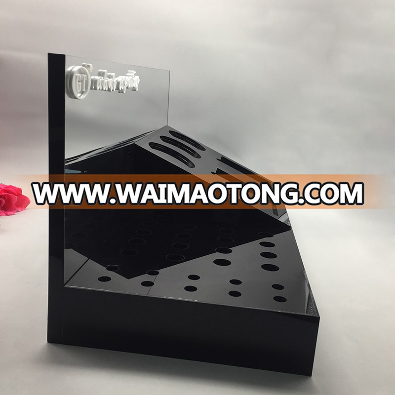 Custom black acrylic cosmetic counter display