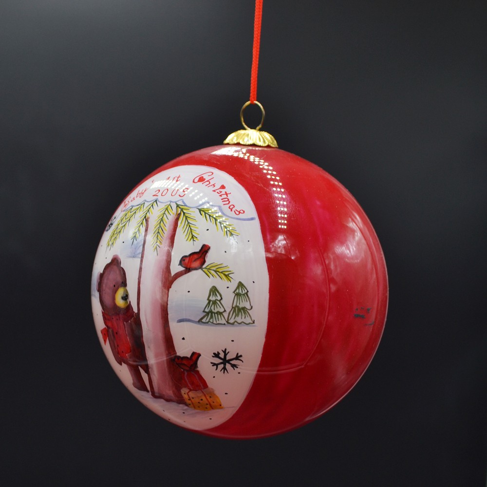 inside painting glass Christmas bauble for Christmas tree