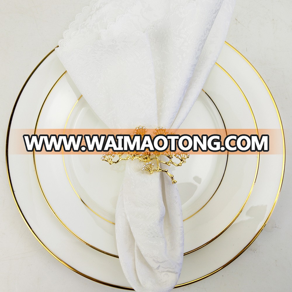 gold and silver pine shape pearl napkin rings