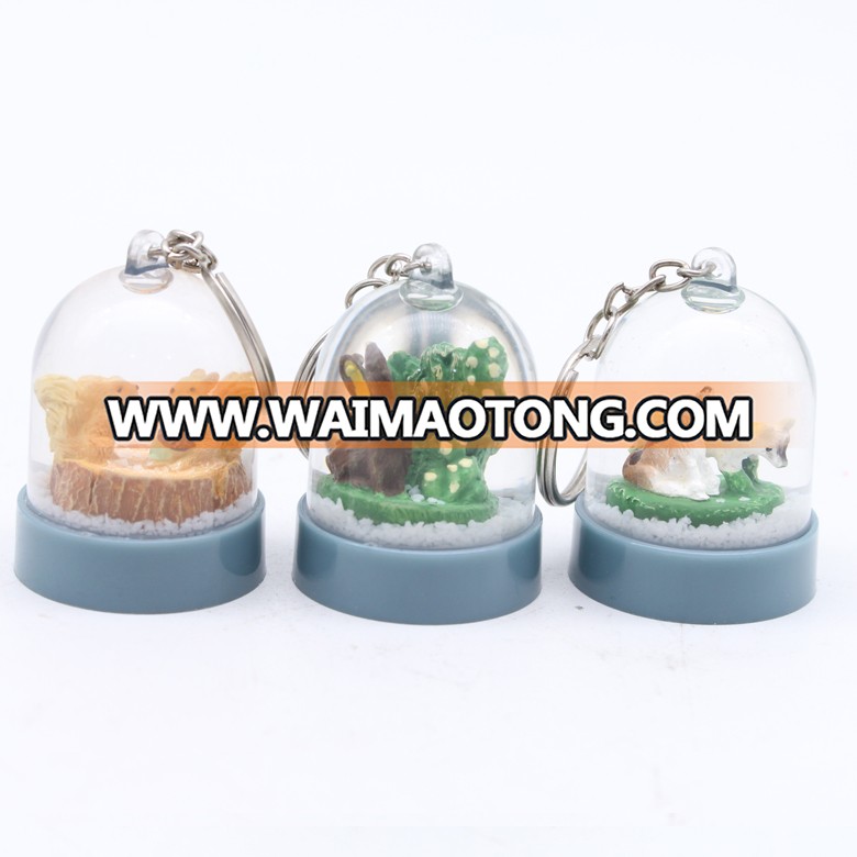 Customized personal design animal plastic keychain snow globe