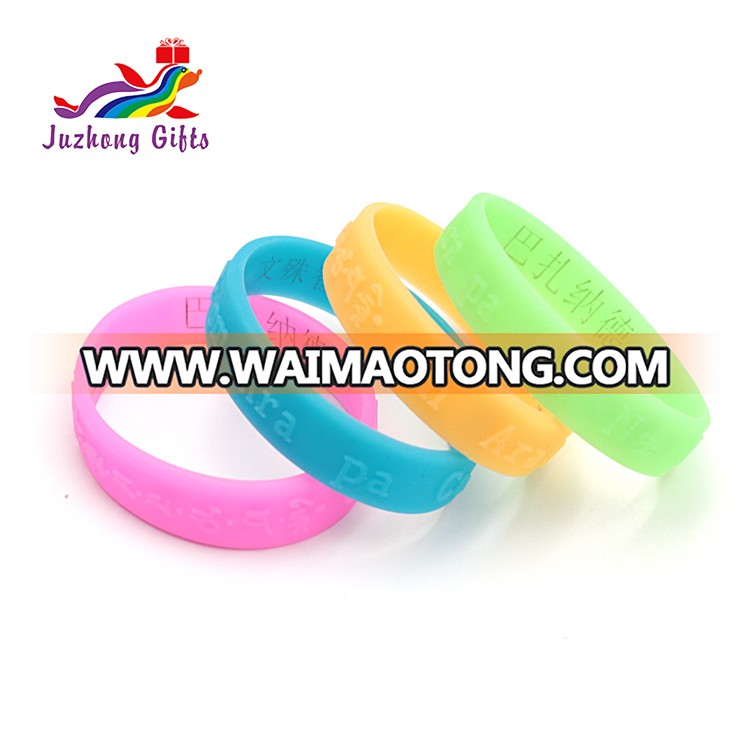 High quality low price color embossed print Buddhist custom logo silicone bracelet wristband