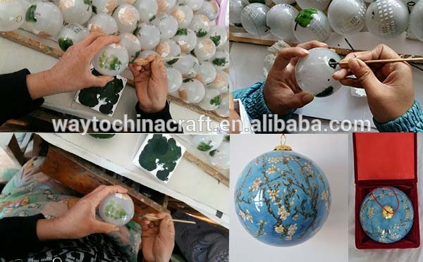 inside painting glass Christmas bauble for Christmas tree