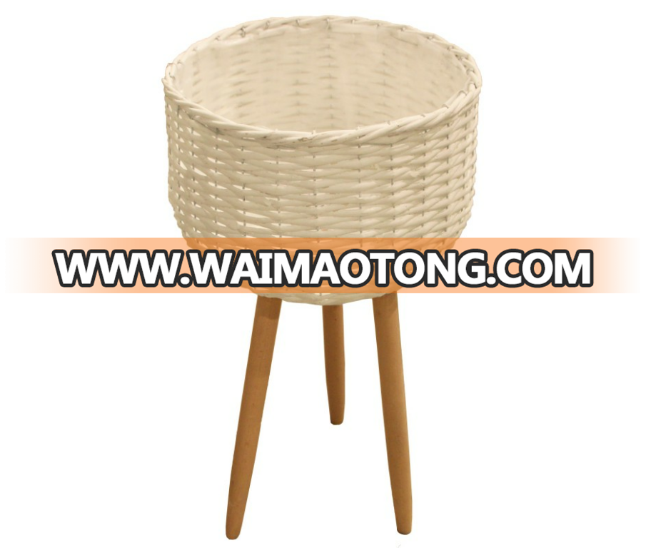 white willow planting pot with wooden feet for green plant