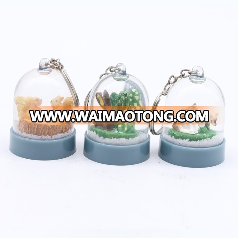 Customized personal design animal plastic keychain snow globe