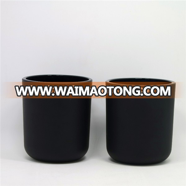 Matte black glass candle holder with smoked wood lid