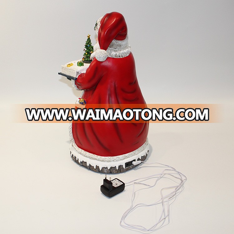 Wholesale indoor tabletop OEM battery Led illuminated Musical Resin Santa Claus Christmas decoration with Moving Village Scene