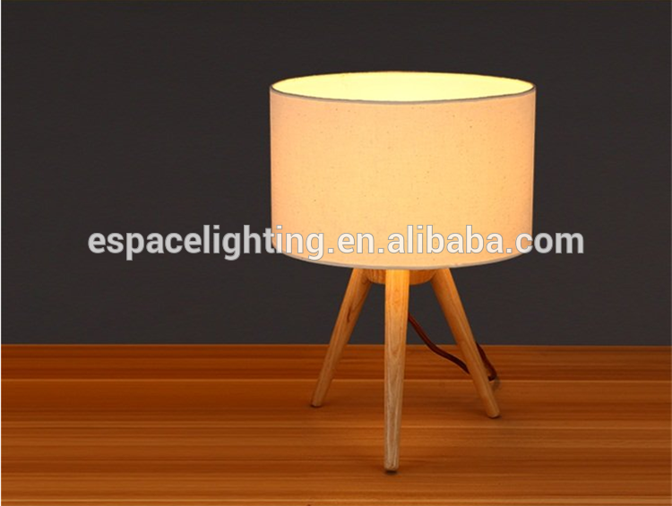 Modern wood tripod base table lamp with edison bulbs