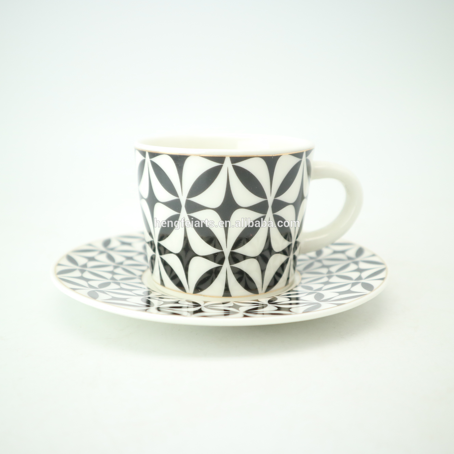 Small ceramic white & black modern design coffee cup with saucer