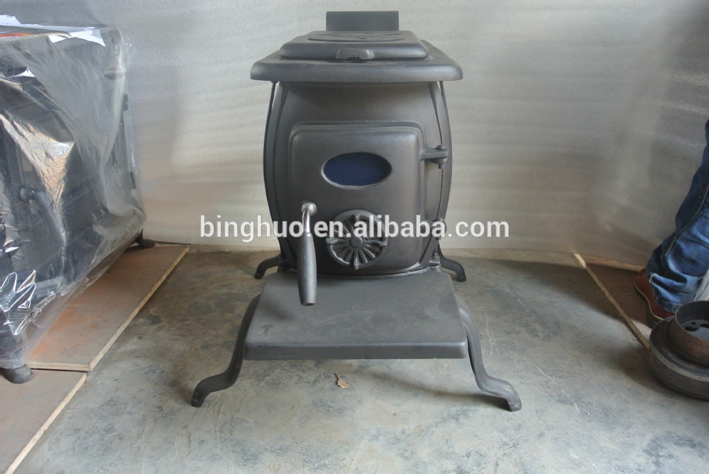 De verwarming,wood burning stove, cast iron cooktop