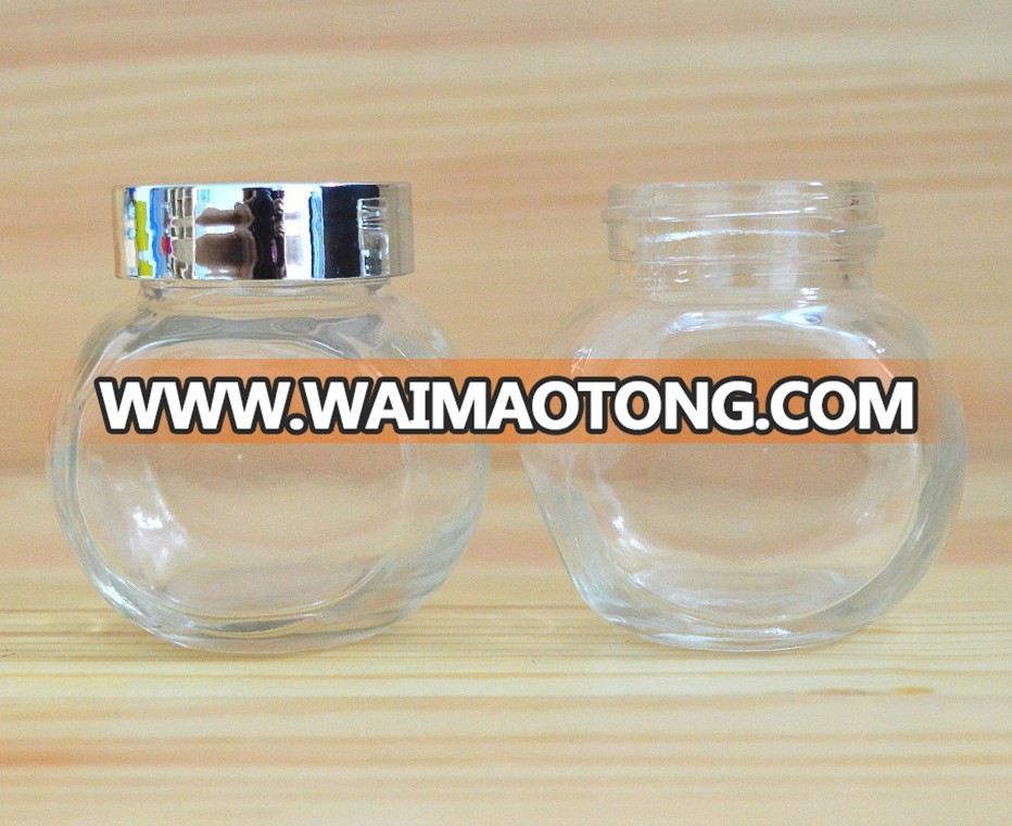 Wholesale flat drum glass jar for candy with plastic lid