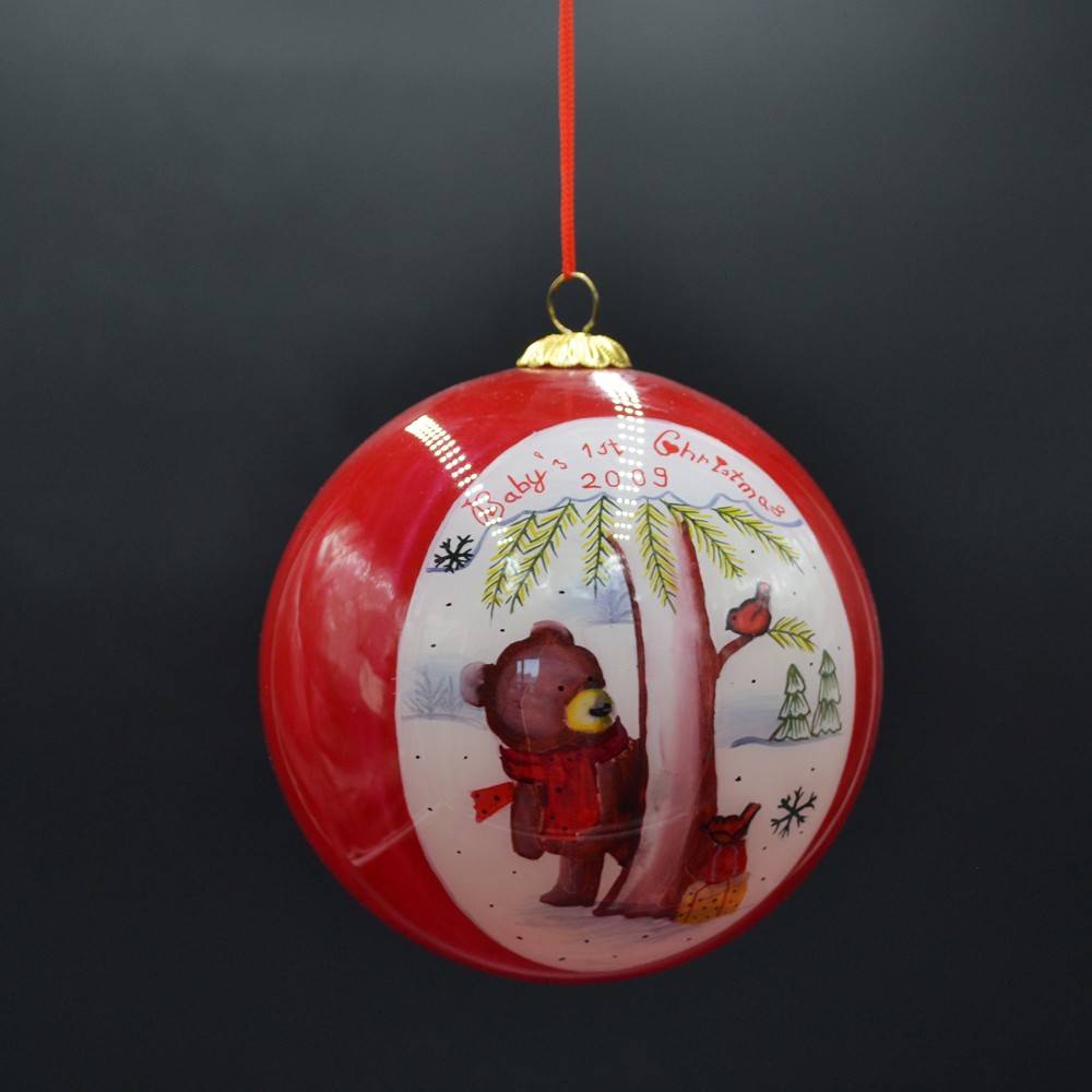 inside painting glass Christmas bauble for Christmas tree