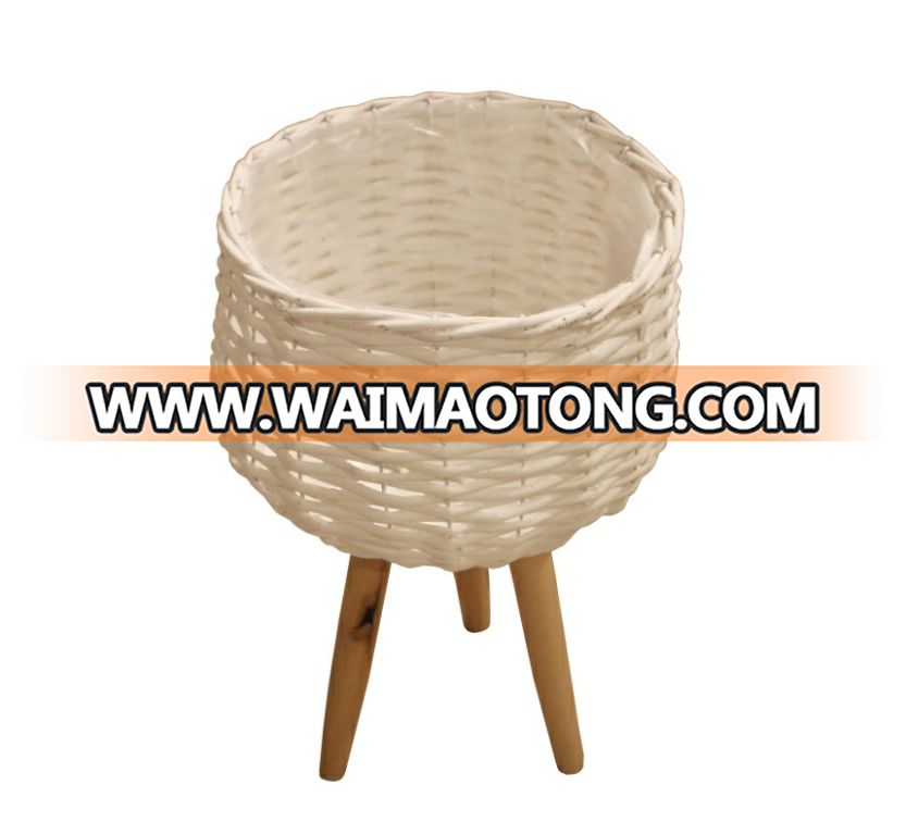 white willow planting pot with wooden feet for green plant