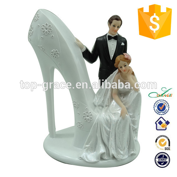 Resin sitting on high heeled shoes wedding couple figurine