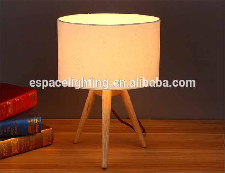 Modern wood tripod base table lamp with edison bulbs