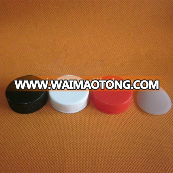 Black plastic cap for glass boston bottle