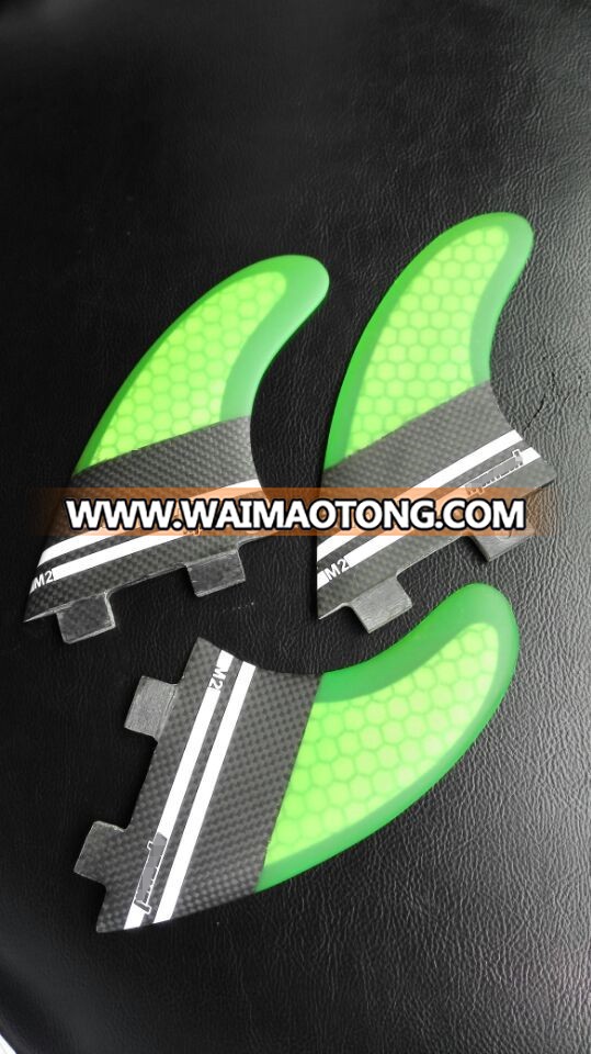 hot FCS G5 surfboard fins with carbon fiber/honey comb