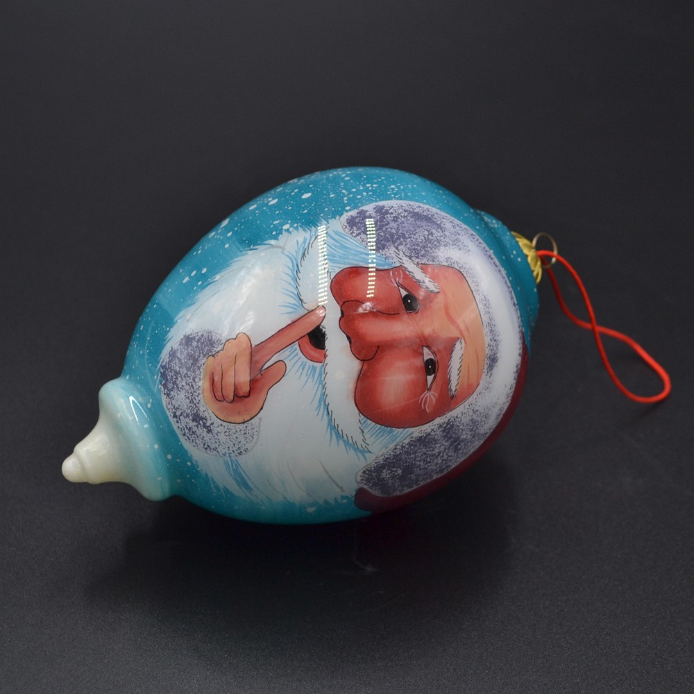 inside painting glass Christmas bauble for Christmas tree