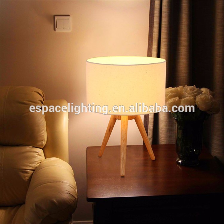 Modern wood tripod base table lamp with edison bulbs