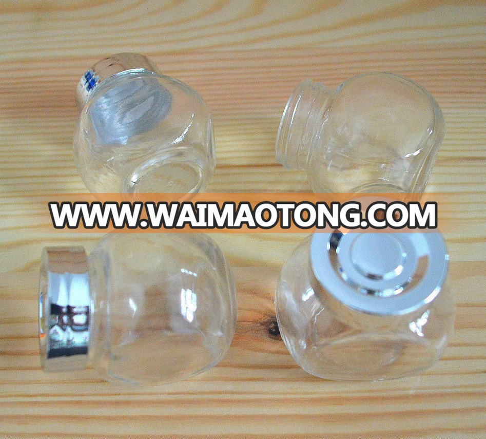 Wholesale flat drum glass jar for candy with plastic lid