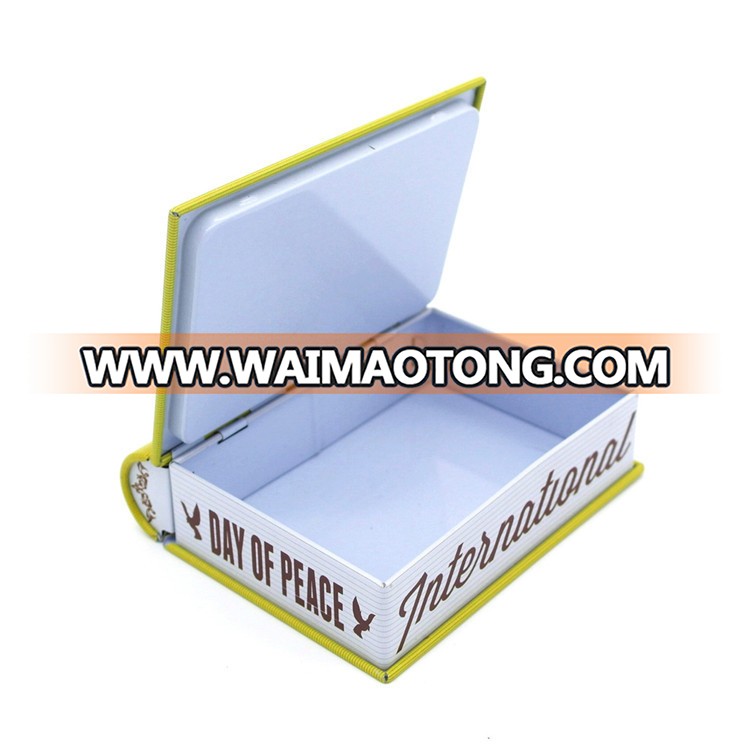 suitcase style tin condom storage box for book