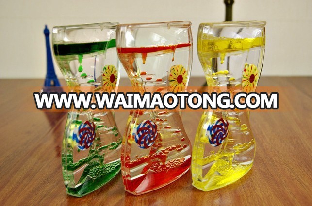 Factory price novelty crafts flowing colored liquid hour glass