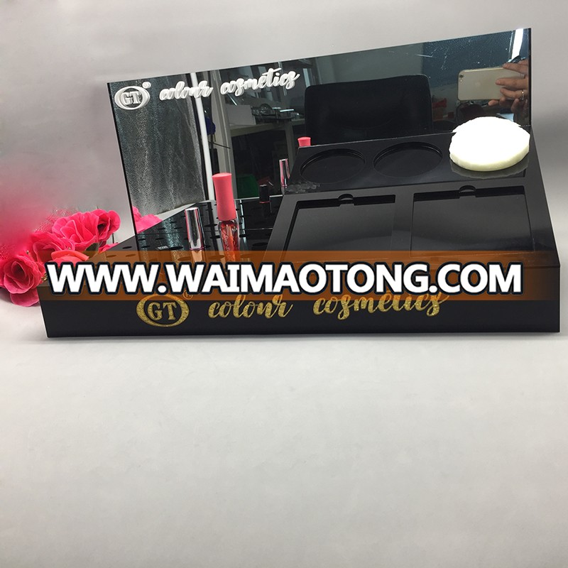 Custom black acrylic cosmetic counter display